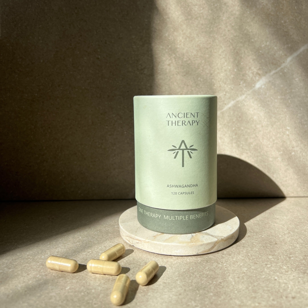 Ancient Therapy organic ashwagandha capsules in natural sunlight