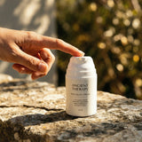 Pain Relief Cream 50 ml outside womens hand pointing