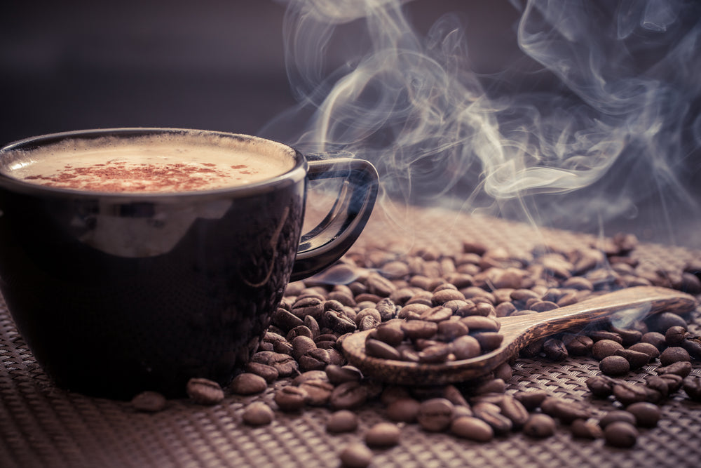 Warm-toned background image with coffee cup and beans